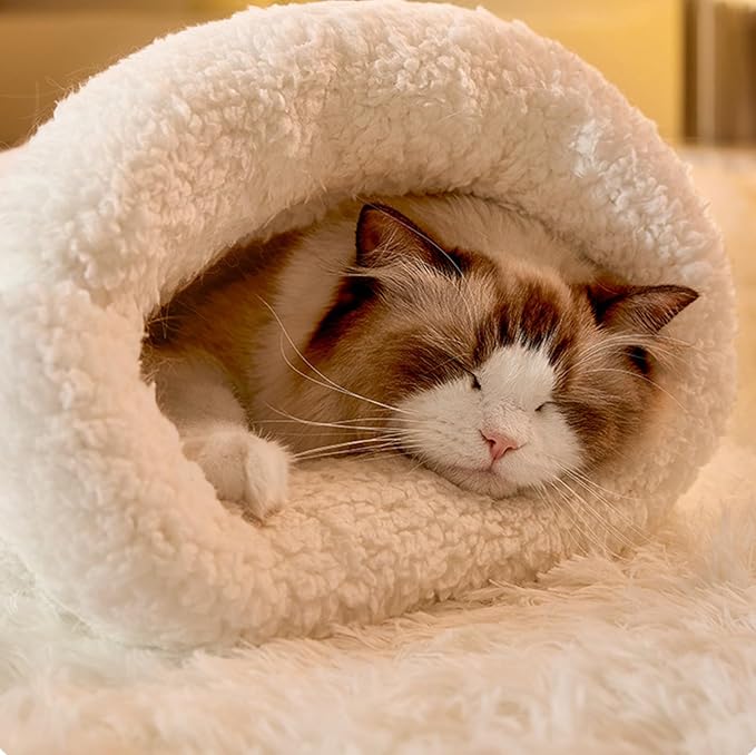 Soft plush cat sleeping bag, a warm pet bed designed for feline comfort and deep sleep.