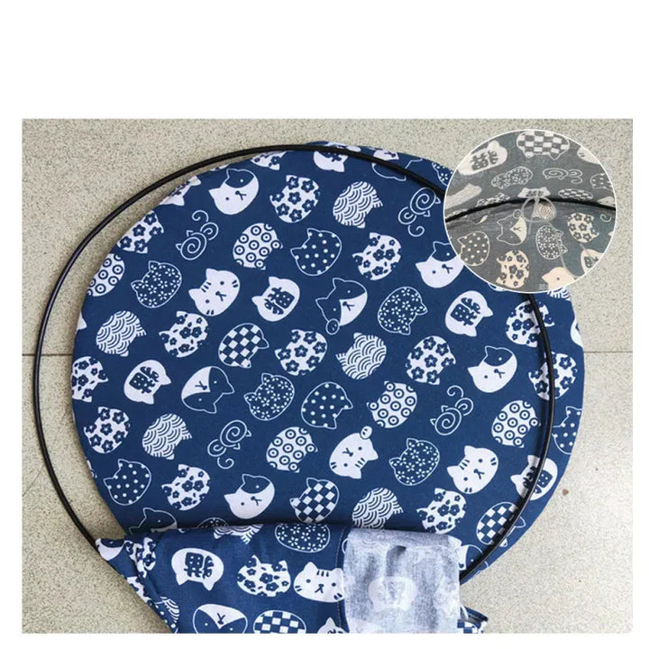 Compact cat tent hammock bed, a snug sleeping cave for small cats, offering security & comfort.