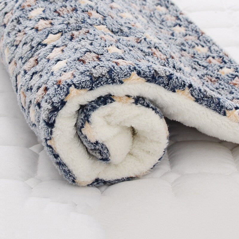 Cozy Cloud plush pet blanket in soft grey, perfect for dogs and cats.