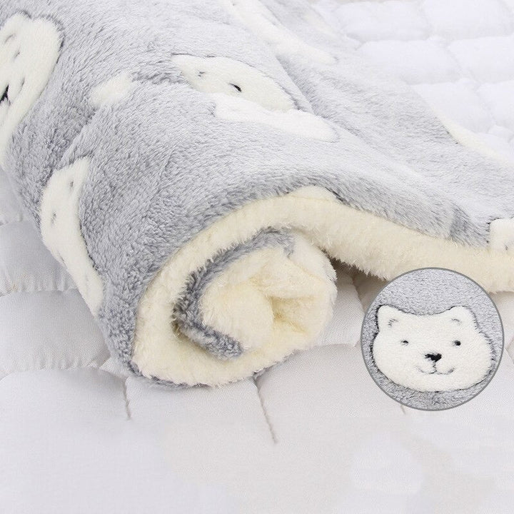 Large pet blanket for dogs and cats, offering plush comfort and warmth.
