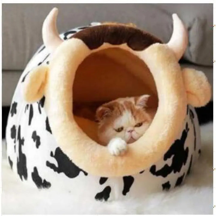 Cozy cow cat bed with cute ears & horns, perfect soft pet bed for ultimate feline comfort. Washable animal bed.
