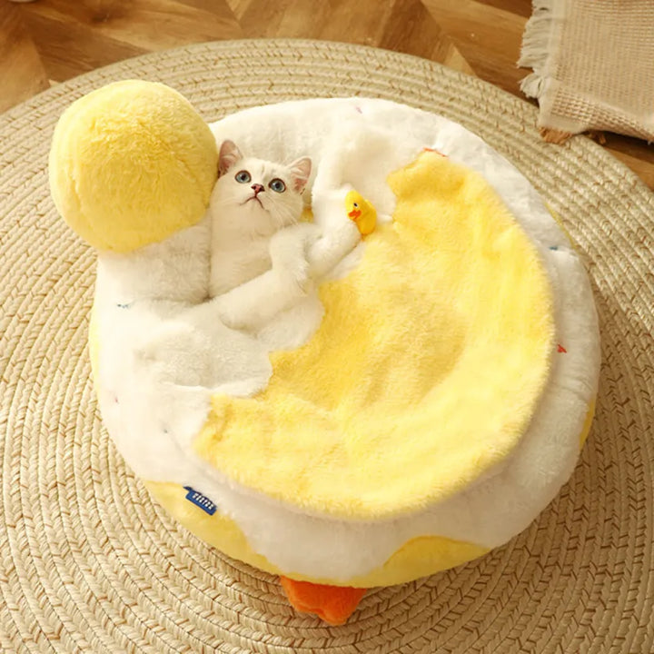 Soft plush duck cat bed providing a cozy, secure retreat for feline relaxation and comfort. Ideal for kittens.