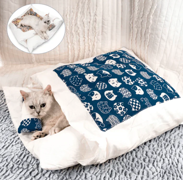 Cozy grey cat sleeping bag for ultimate feline warmth & comfort. A snug, washable pet bed.