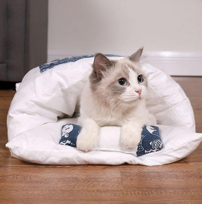 Soft, washable pet bed sleeping bag for cats. Perfect for snuggling, deep sleep & feline comfort.