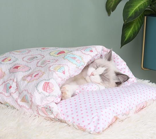 Plush cat sleeping bag pet bed for ultimate feline comfort and deep, warm snuggling sleep.