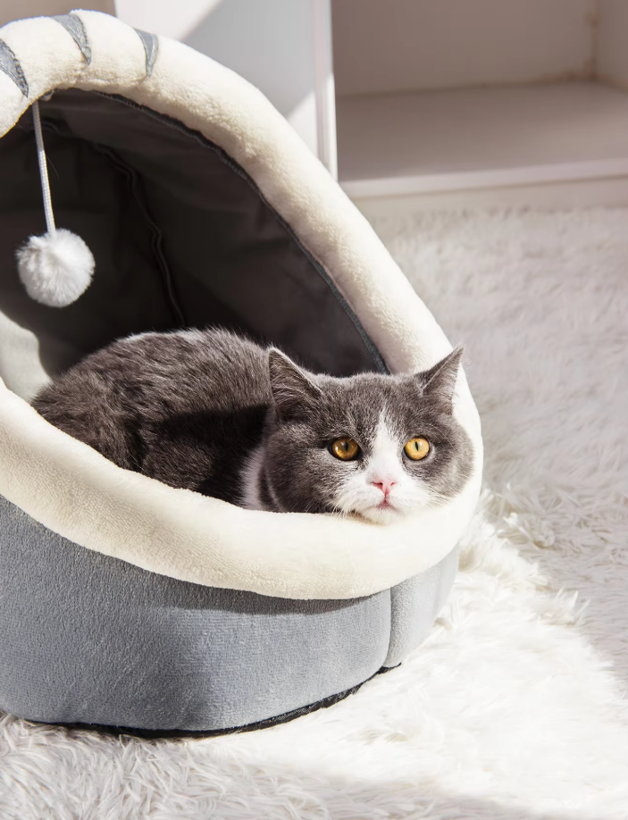 Unique igloo-shaped cat bed providing a soft, cozy, and private pet hideaway for your feline.