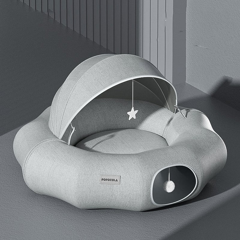 Inviting pet bed for cats & small dogs with a removable roof & built-in toy for play and relaxation.