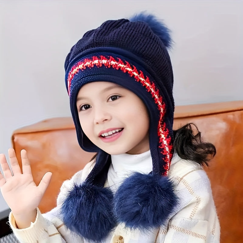 Children's warm winter hat. Knit with ear flaps & a cute pom-pom, perfect for cold weather adventures.