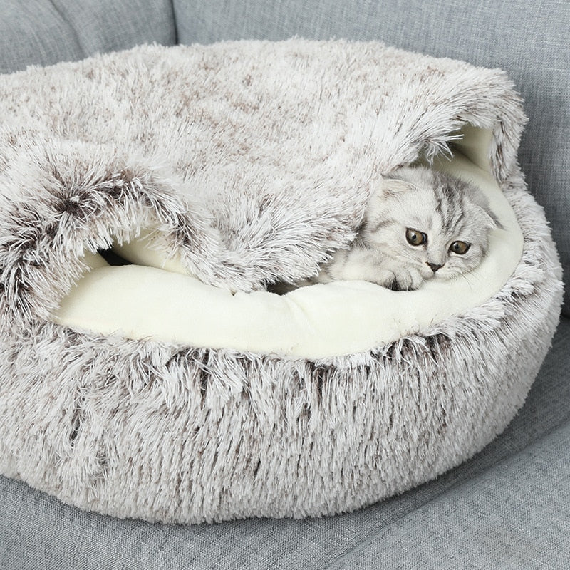 Soft gray plush pet cave sanctuary, ideal as a washable dog or cat bed.