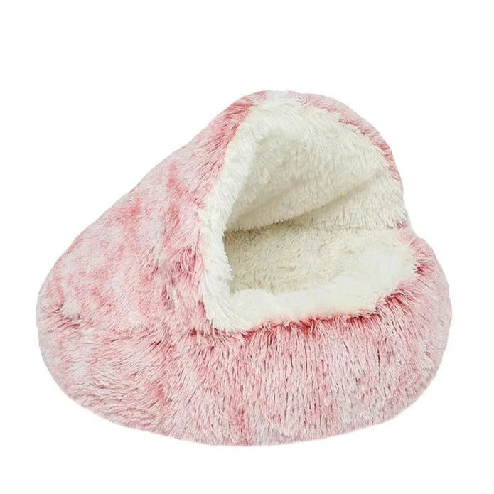 Cozy plush pet cave bed in pink, a soft sanctuary for your small dog or cat.