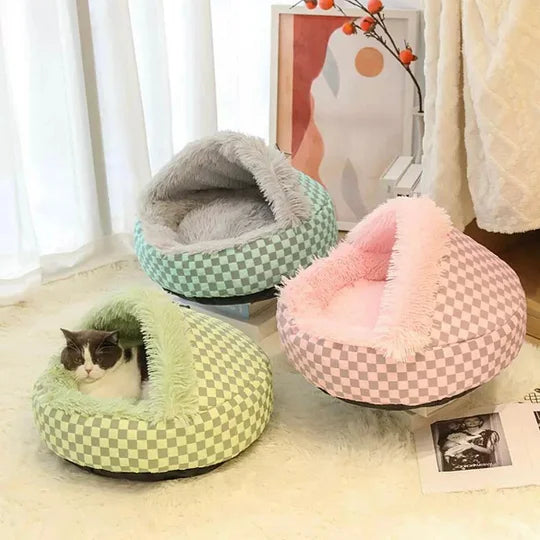 Cozy plaid cat cave bed for ultimate feline comfort & warmth. Plush hideaway for secure naps.