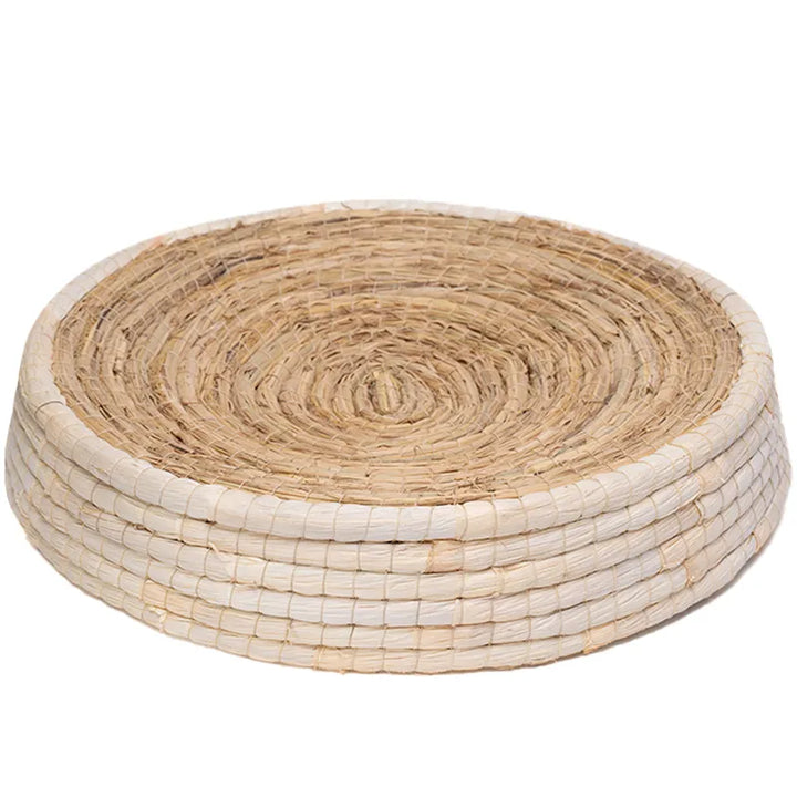 Elegant natural cat bed, a soft round pet sanctuary made from eco-friendly materials, perfect for any cozy home.
