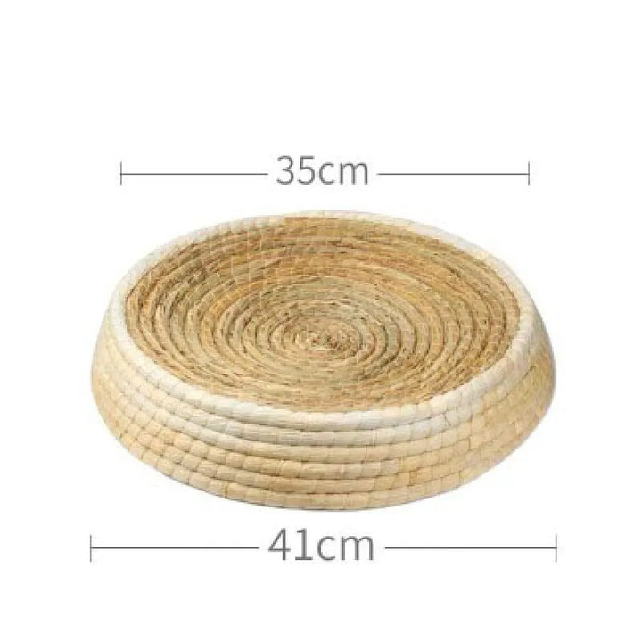 Comfortable natural pet bed, a soft round cat sanctuary made from breathable materials, ideal for year-round feline coziness.