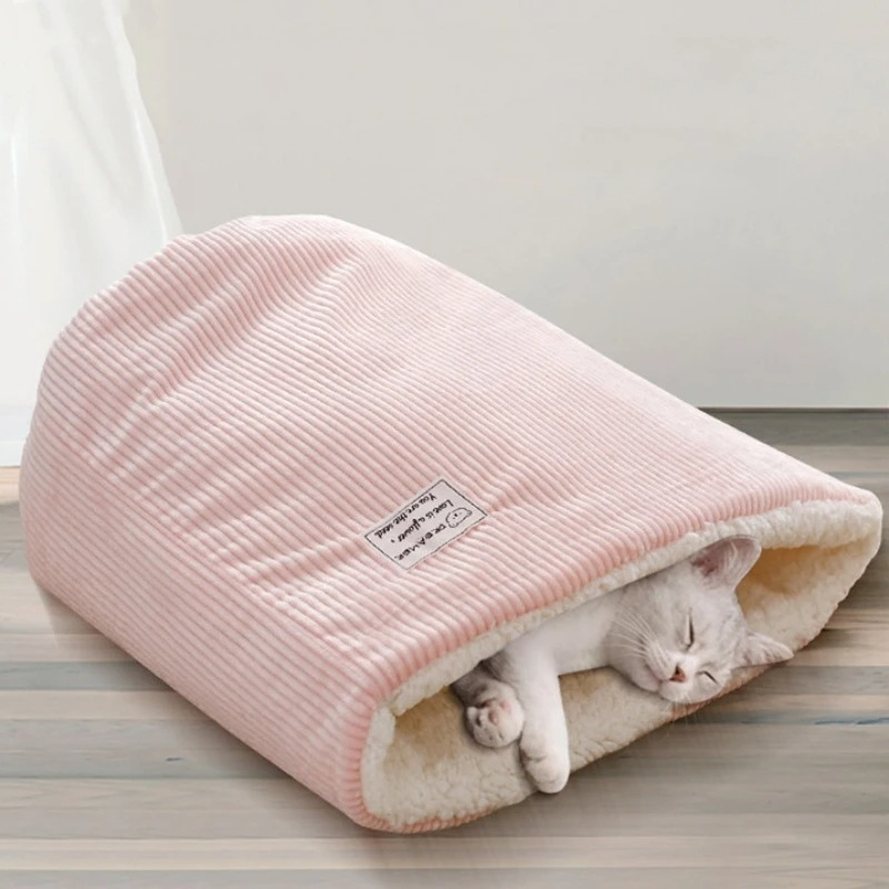 Cozy SnowPaws plush cat bed in pink, perfect for winter comfort. Available in S/L sizes.