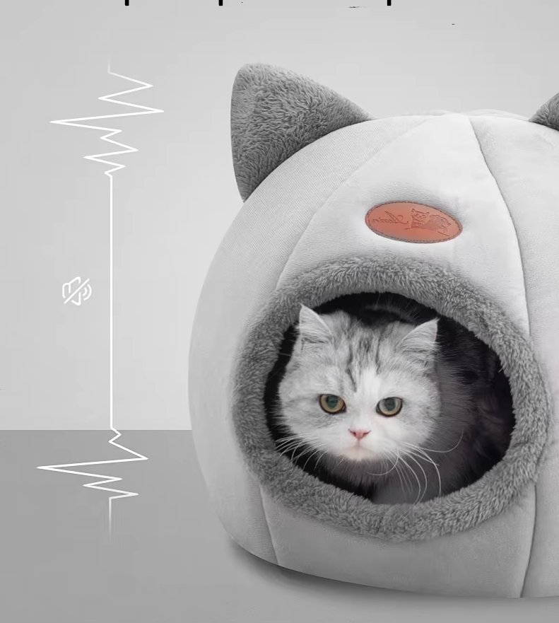 Plush warming cat bed, perfect for small dogs too. Features a soft house design & comfortable removable cushion.