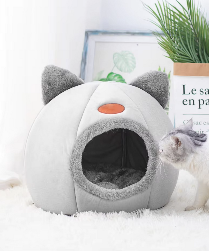Comfortable gray pet bed house, a cozy warming cat bed with a plush, removable cushion for sleep.