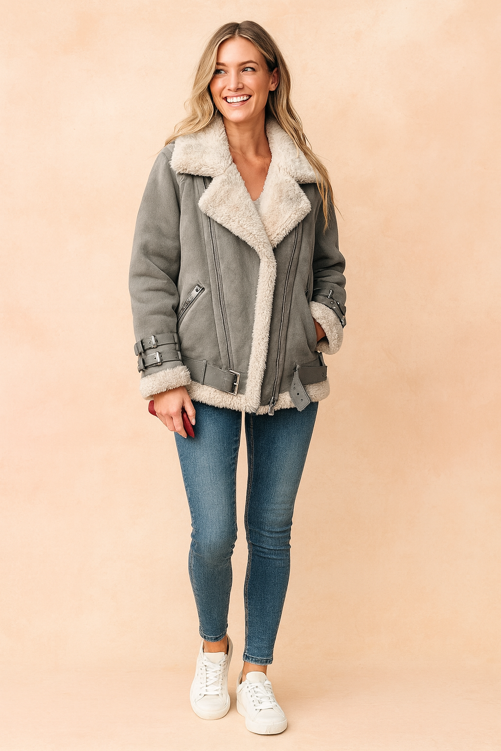 Stylish women's winter outerwear: a warm, cozy shearling aviator jacket with stripes.