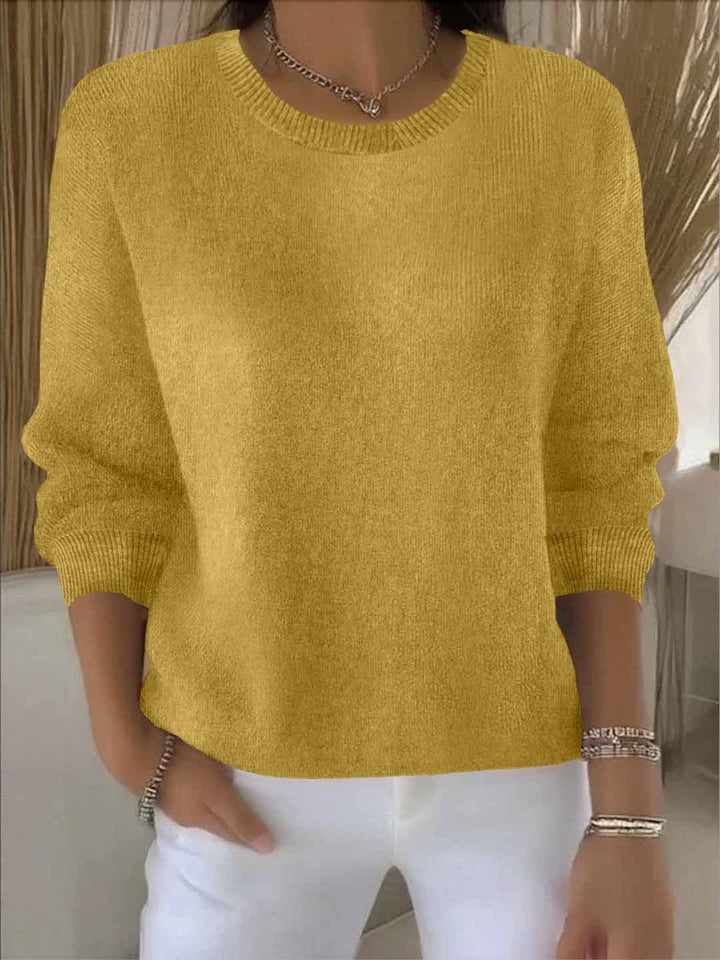 Cozy women's knit jumper, perfect for elegant autumn/winter fashion and comfort.