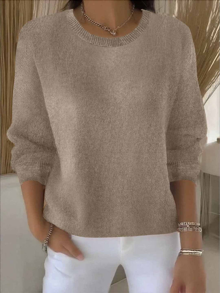 Stylish women's sweater, a comfortable and chic long sleeve knitwear piece.
