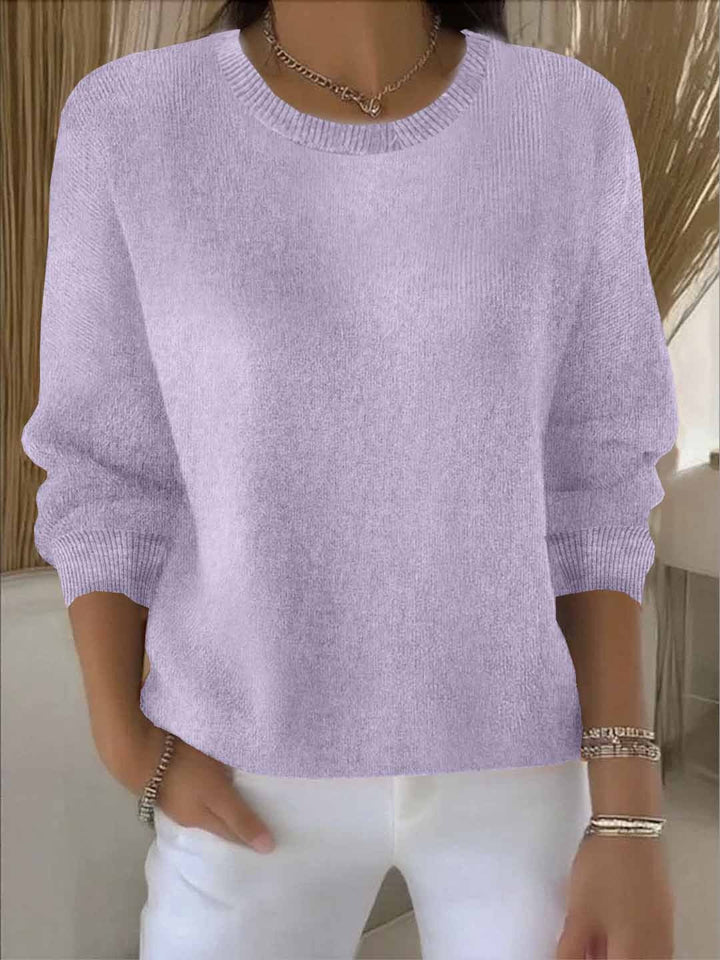 Elegant women's cozy jumper, a long sleeve knit sweater for autumn/winter fashion.