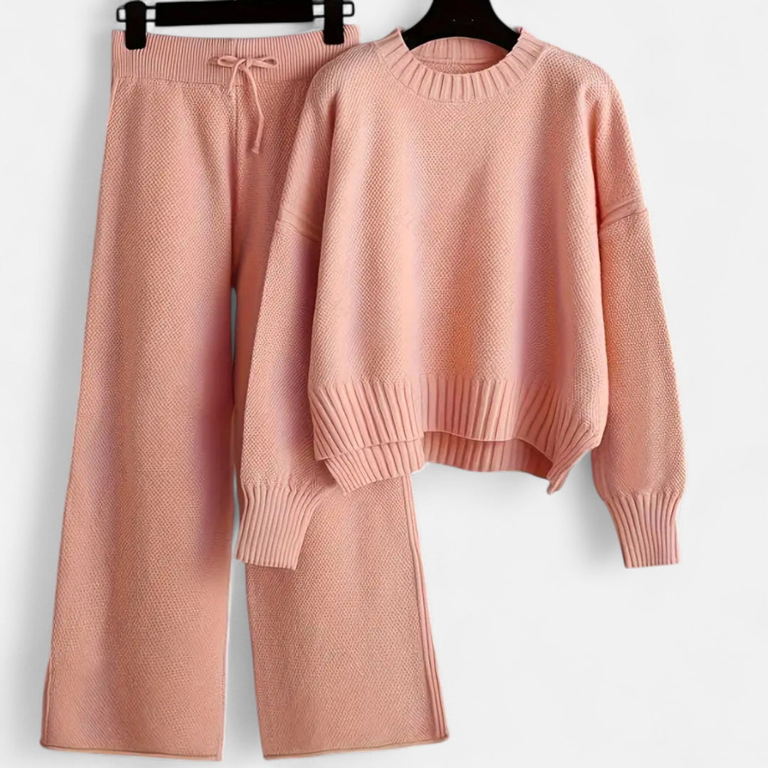 Cozy women's knit sweater and wide-leg trouser set, perfect for autumn fashion.