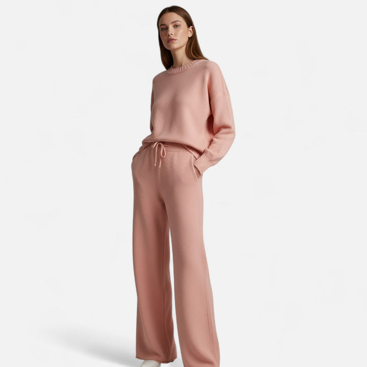 Elegant two-piece lounge set featuring a soft knit sweater and flowy wide-leg pants.
