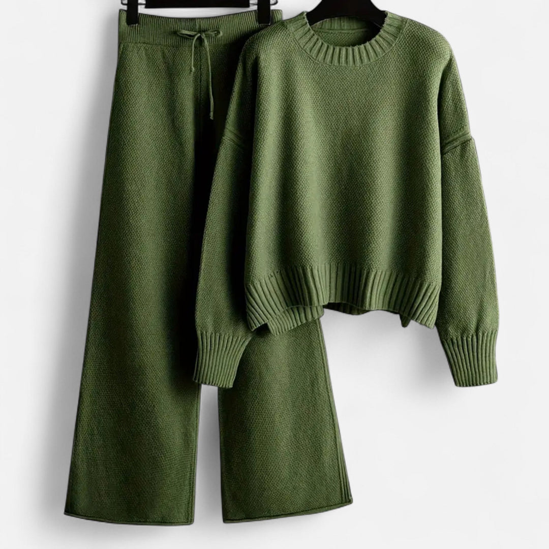 Stylish women's two-piece set: warm knit sweater paired with chic wide-leg pants.