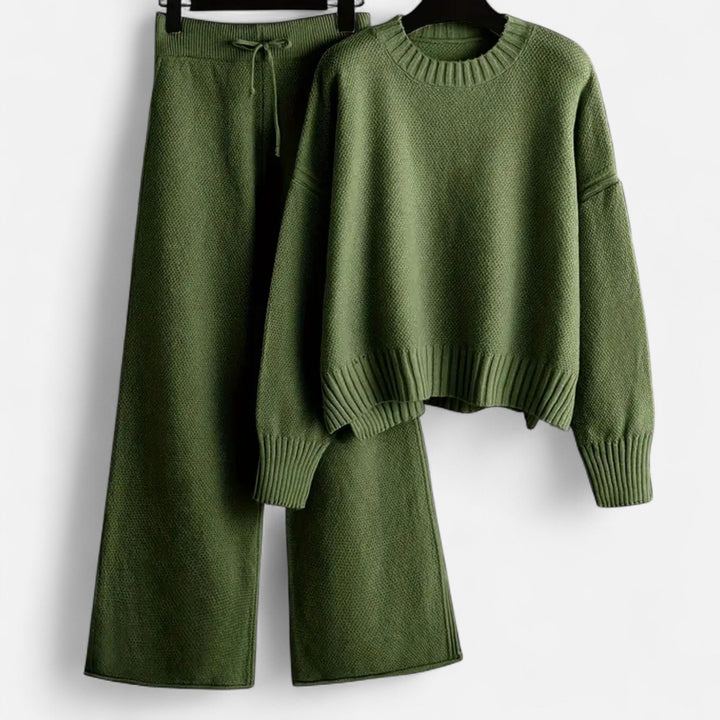 Stylish women's two-piece set: warm knit sweater paired with chic wide-leg pants.