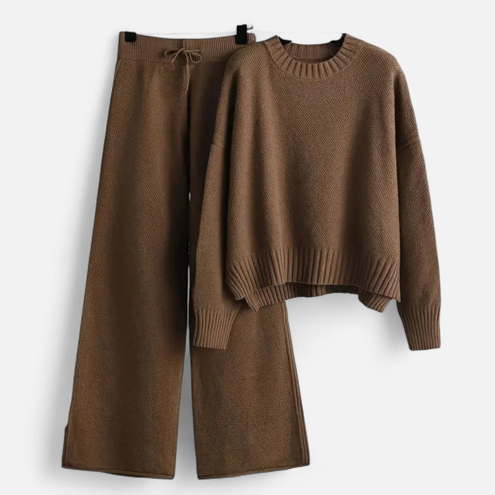 Model wearing a women's knit sweater and matching wide-leg pants in a stylish ensemble.