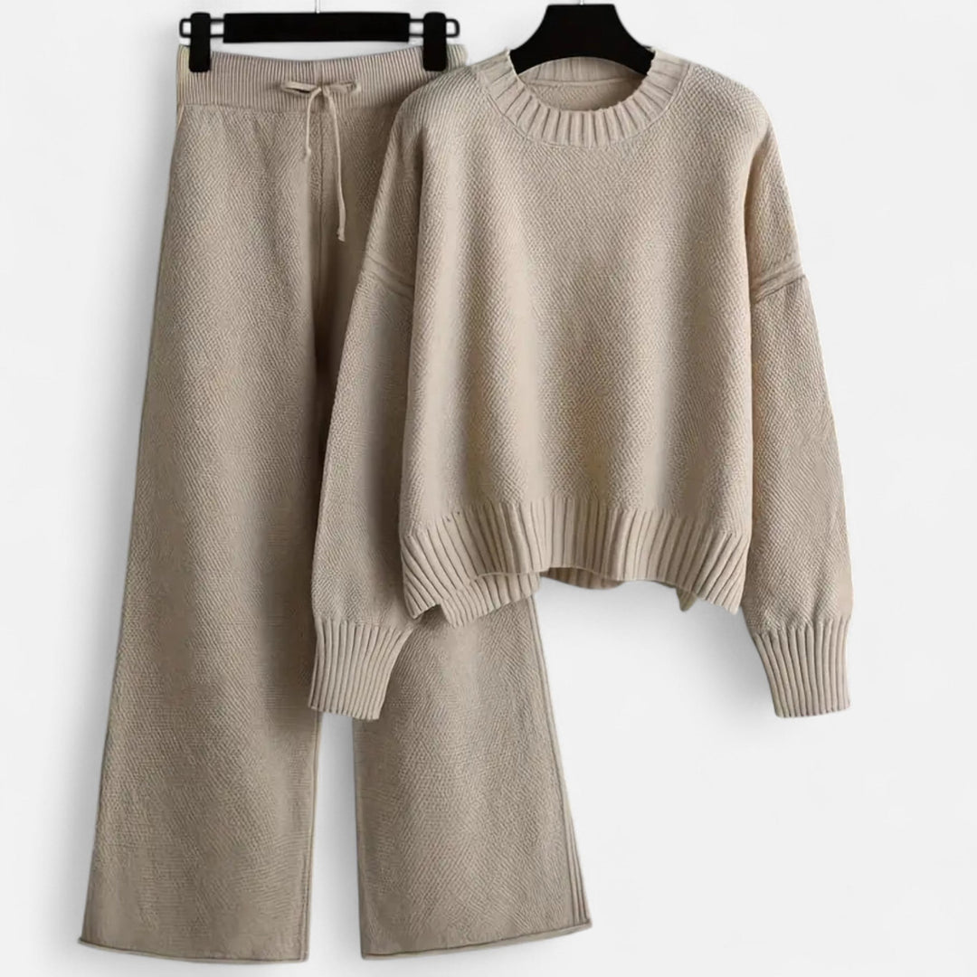 Close-up of the texture on the women's knit sweater and wide-leg trousers set.