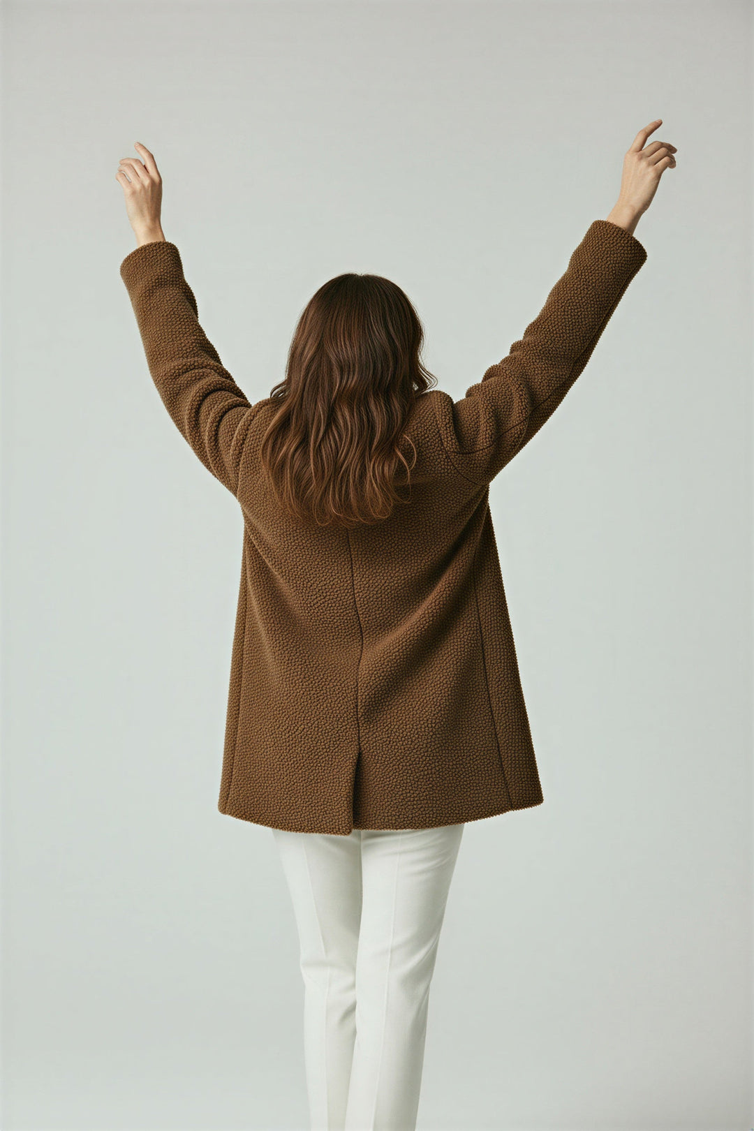 Everyday comfort meets style in this women's sherpa winter coat.