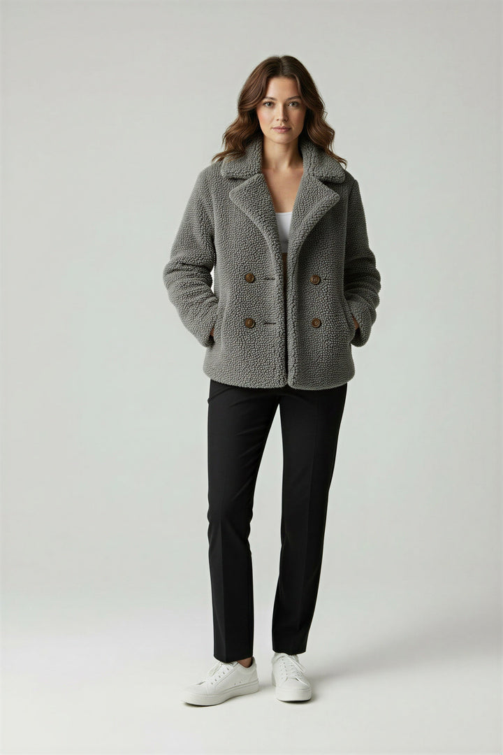 Stylish women's sherpa coat, perfect for casual outerwear and winter wear.