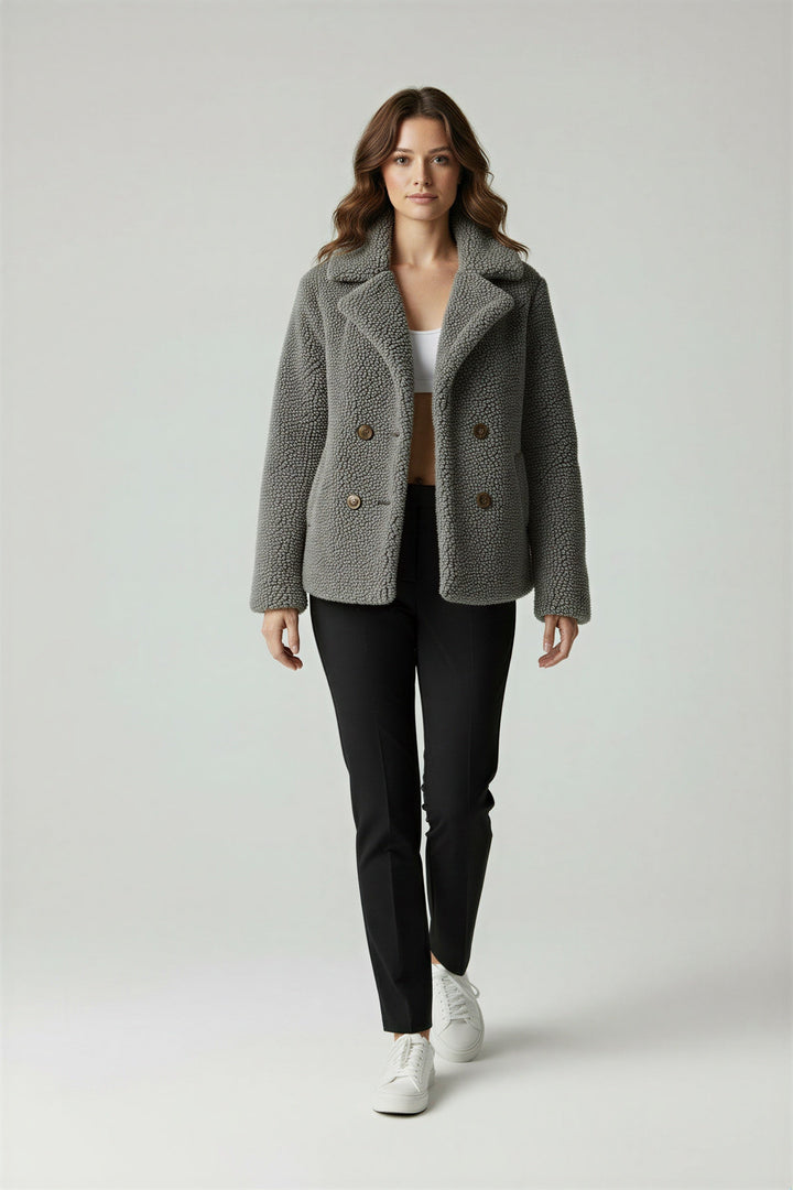 Warm and fashionable oversized sherpa jacket for women's casual outfits.