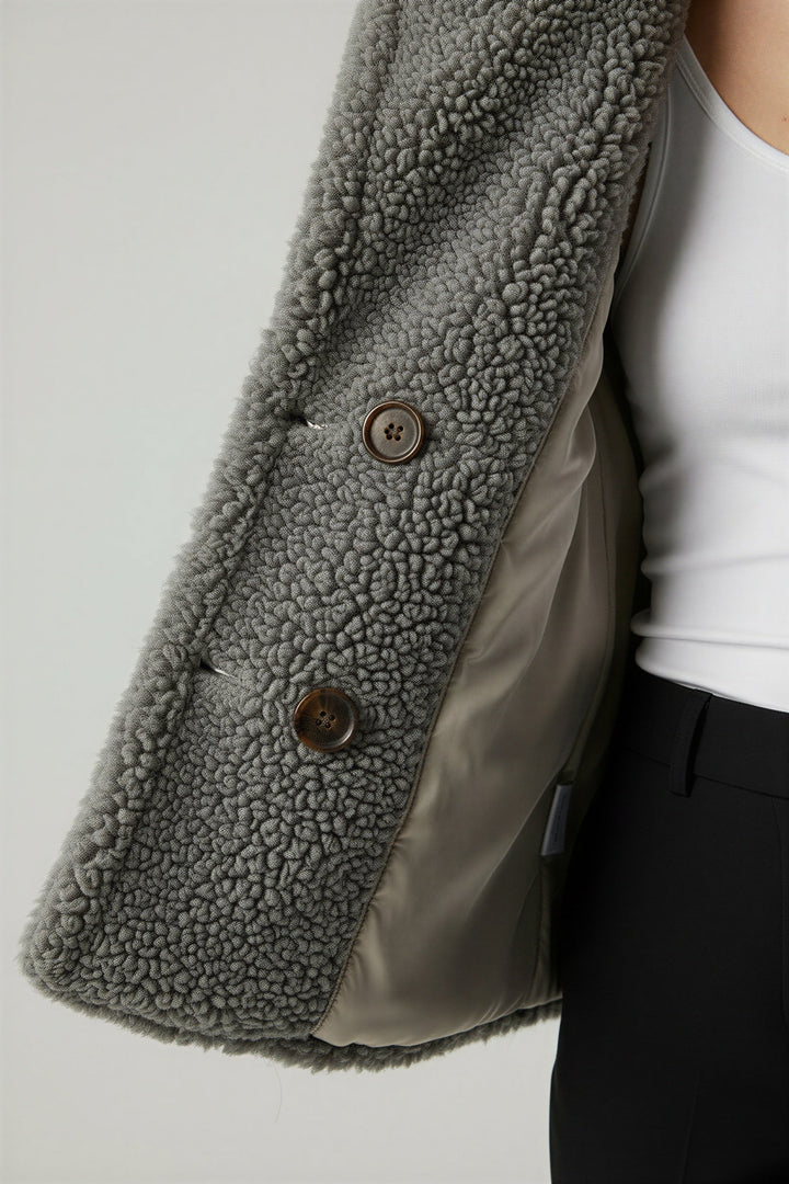 Chic women's teddy coat, a must-have for cozy winter fashion.
