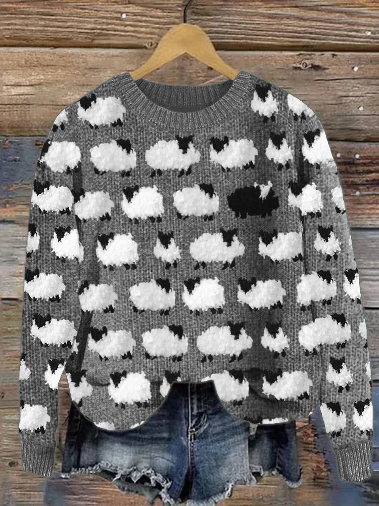 Cozy women's pullover sweater with a charming sheep pattern. Perfect for fall/winter casual wear and chic comfort.