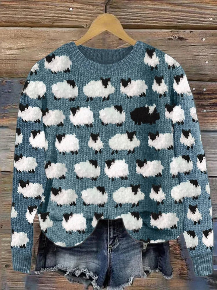 Chic women's long sleeve pullover sweater featuring a fun sheep animal print. Versatile top for cozy and stylish casual outfits.