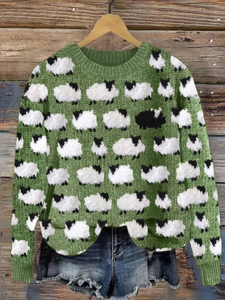 Comfortable women's long sleeve pullover sweater with a unique and fun sheep pattern. Ideal for cozy fall/winter fashion.
