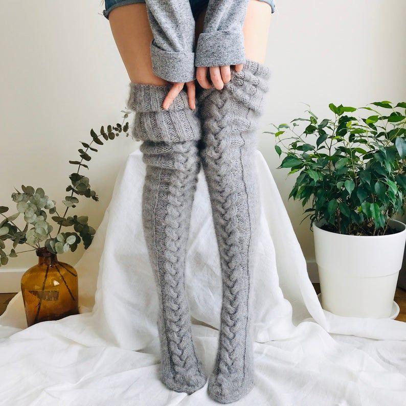 Cozy women's thigh-high knit socks in a warm winter design