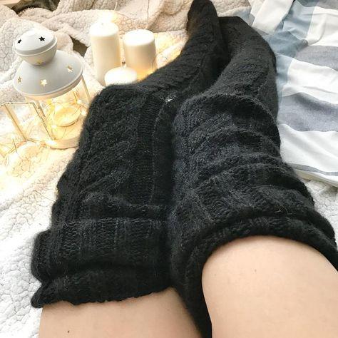 Close-up of soft, comfortable knit thigh-high socks for lounging