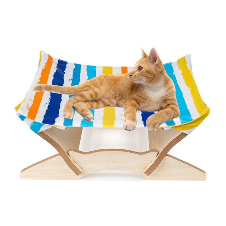 Stylish wooden cat bed with colorful fabric cover. Comfortable cat lounger offers cozy pet comfort, easy to clean.