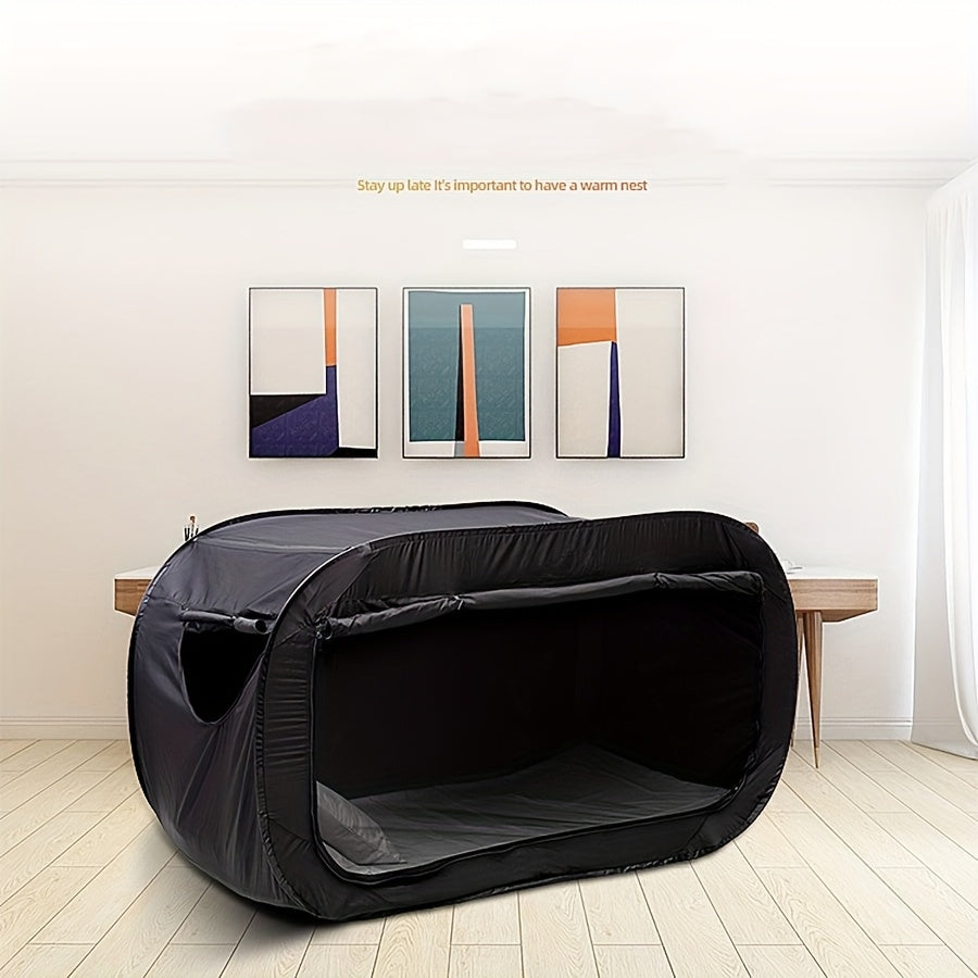 CozyNest folding tent bed providing insect protection for comfortable outdoor sleep.