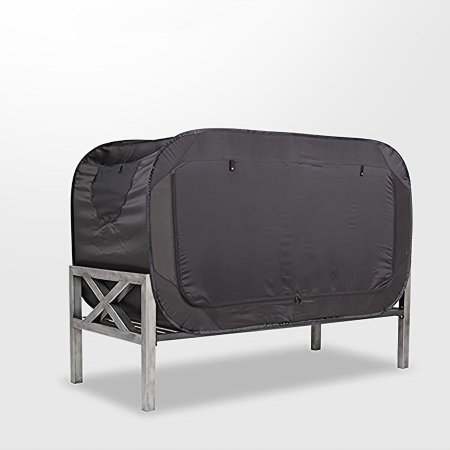 Compact CozyNest folding tent bed, ideal for camping trips and backyard adventures.
