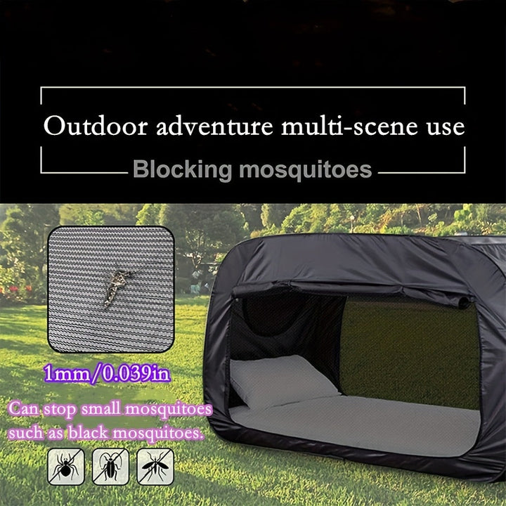 Open CozyNest folding tent bed revealing a comfortable sleeping surface.