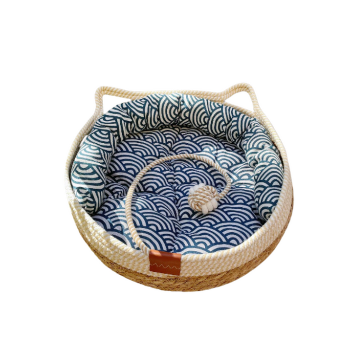Interactive cat toy and comfortable cat bed combo from CozyNest, engaging and relaxing.