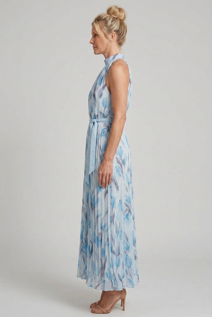 Sleeveless light blue floral midi dress, featuring a chic halter neck for summer comfort.