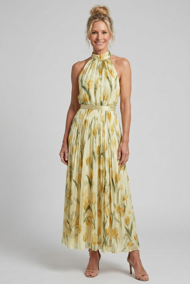 Gorgeous yellow floral midi dress with a flowy silhouette & elegant halter neck.