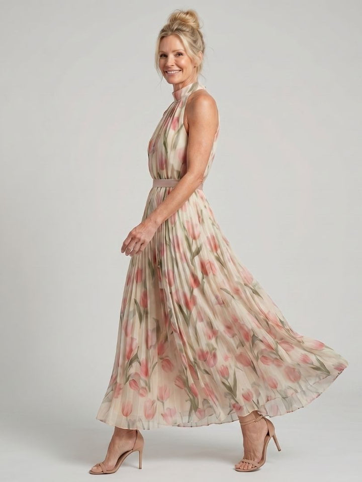 Women's sleeveless cream floral midi dress, ideal for elegant summer events.