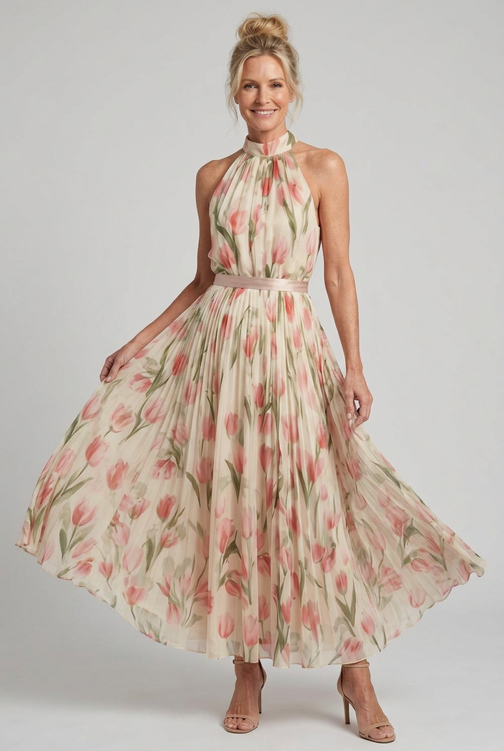 Chic yellow floral summer dress with a flattering halter neck design for women.