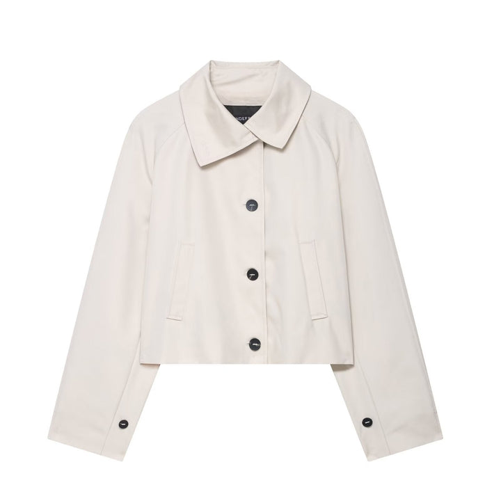 Versatile cream women's cropped jacket. Relaxed fit for spring & autumn, chic modern outerwear.
