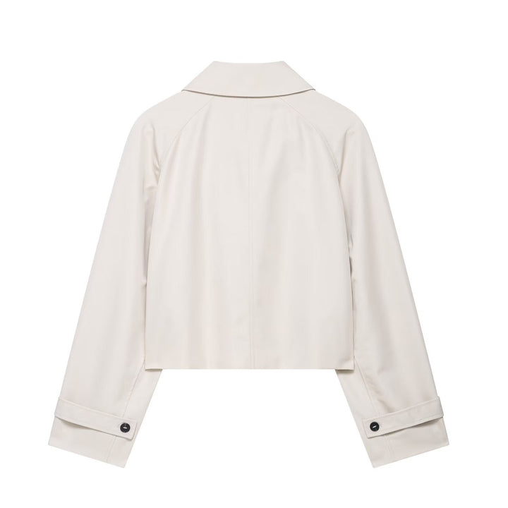 Effortless cream women's cropped jacket. Relaxed fit short design, perfect for chic spring & autumn fashion.